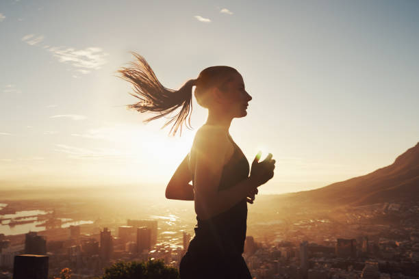 woman running in the sunset