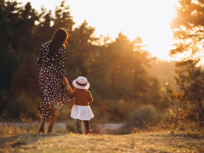 mother and daughter in sunset